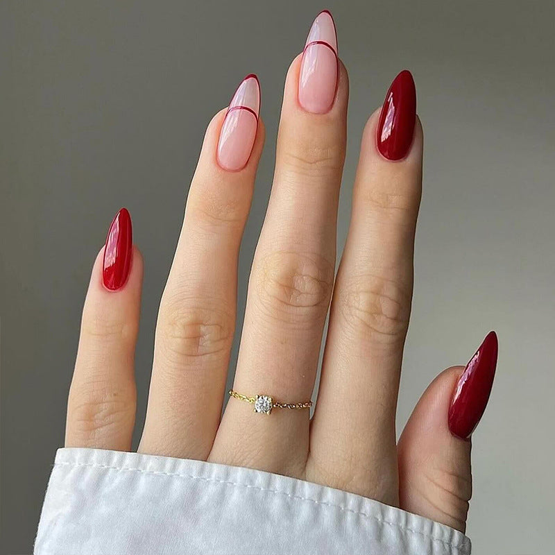 Artful stiletto nails with heart-shaped accents Stornfield