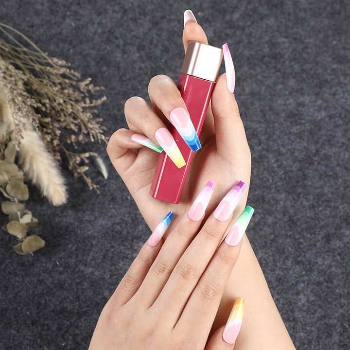Artificial nails in luxurious ombre design with rhinestone accents Stornfield