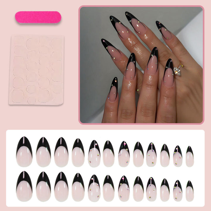 Artificial nail set with elegant tips and glamorous decorations Stornfield