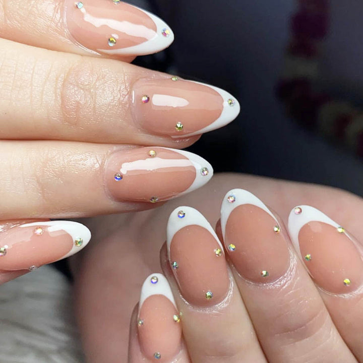 Nail kit with elegant French tips and sparkling accents Stornfield