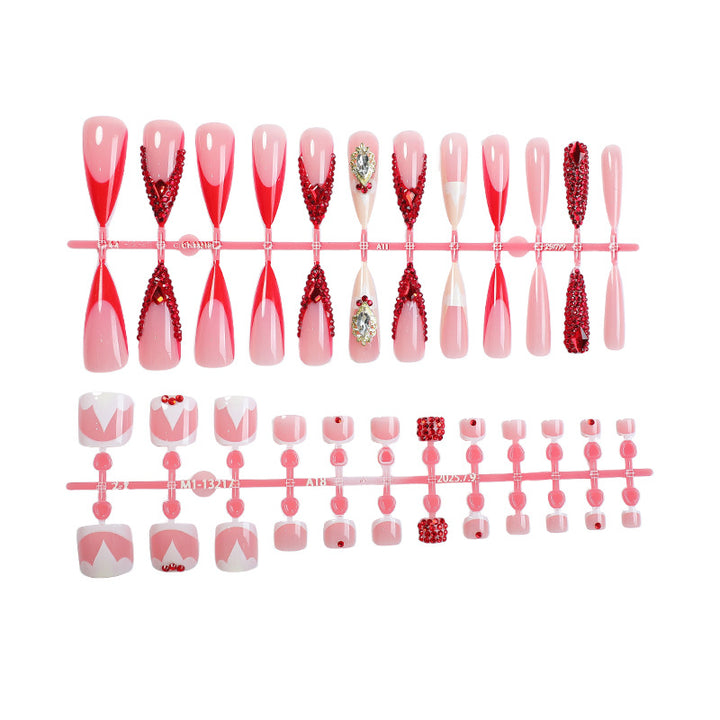 Artificial nail set with sparkling rhinestone accents and romantic motifs Stornfield