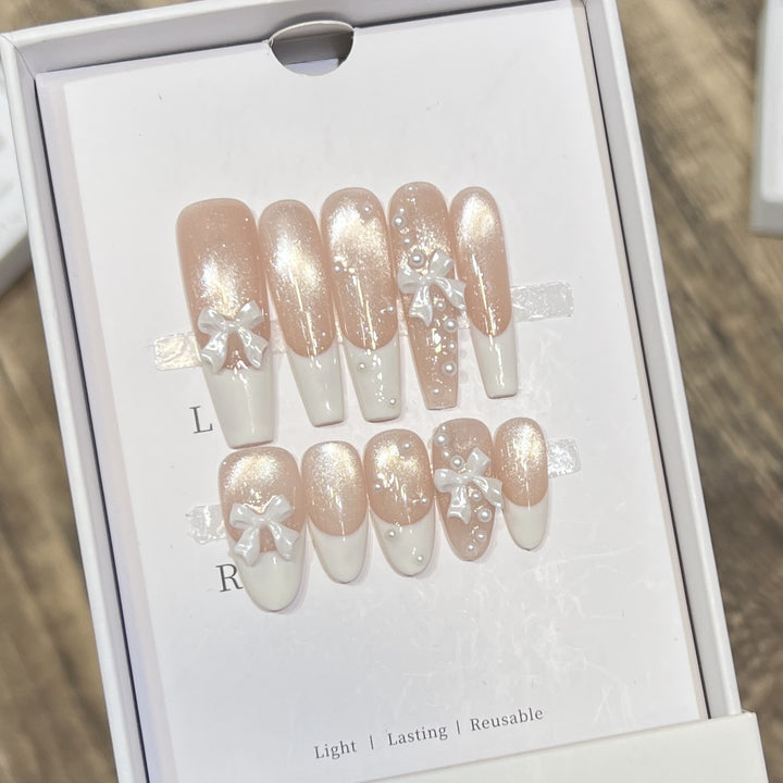 Decorative Long Press-On Nail Set with Bow and Pearl Accents Stornfield