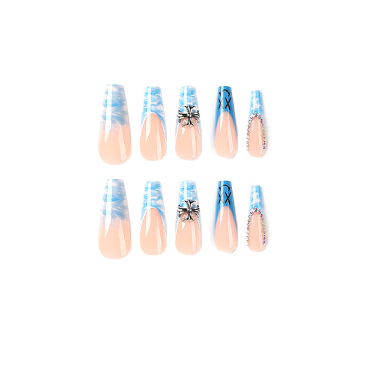 Artistic acrylic nails with marbled design and unique embellishments Stornfield