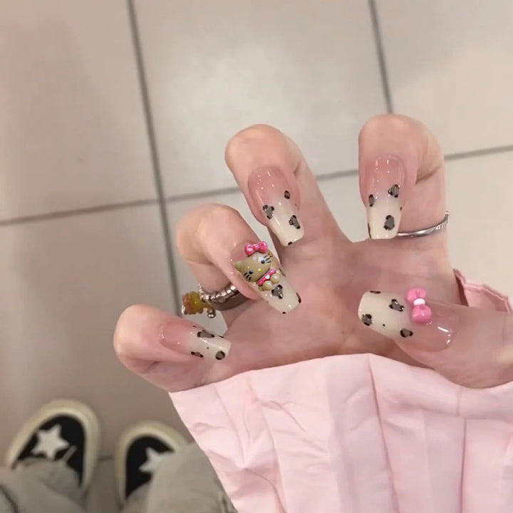 Playful art false nails with cute animal motifs Stornfield