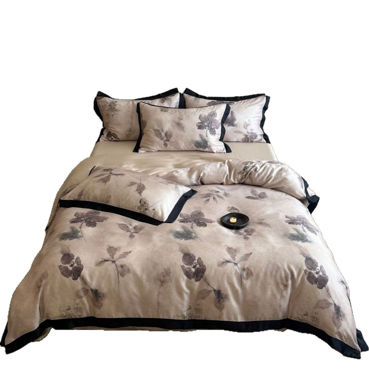 Bedding set made of fine cotton satin with a watercolor flower print and contrast piping