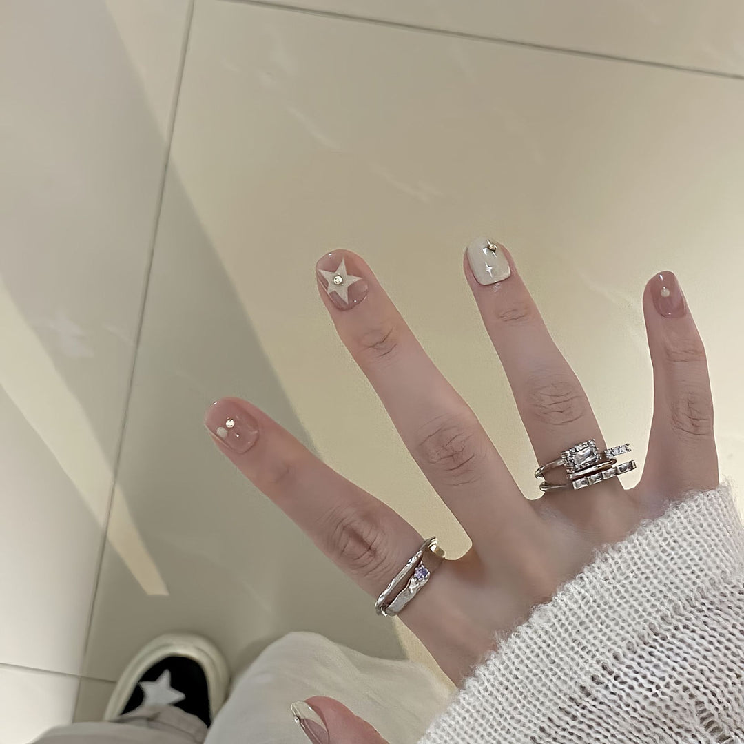 Artificial nails with elegant glitter accents Stornfield