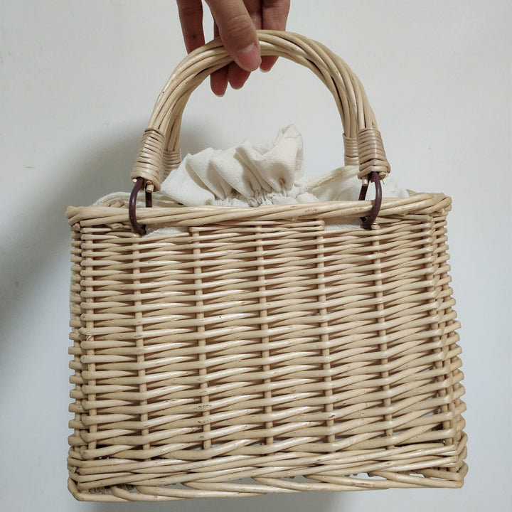Women's handbag made of braided material with cotton drawstring closure Stornfield