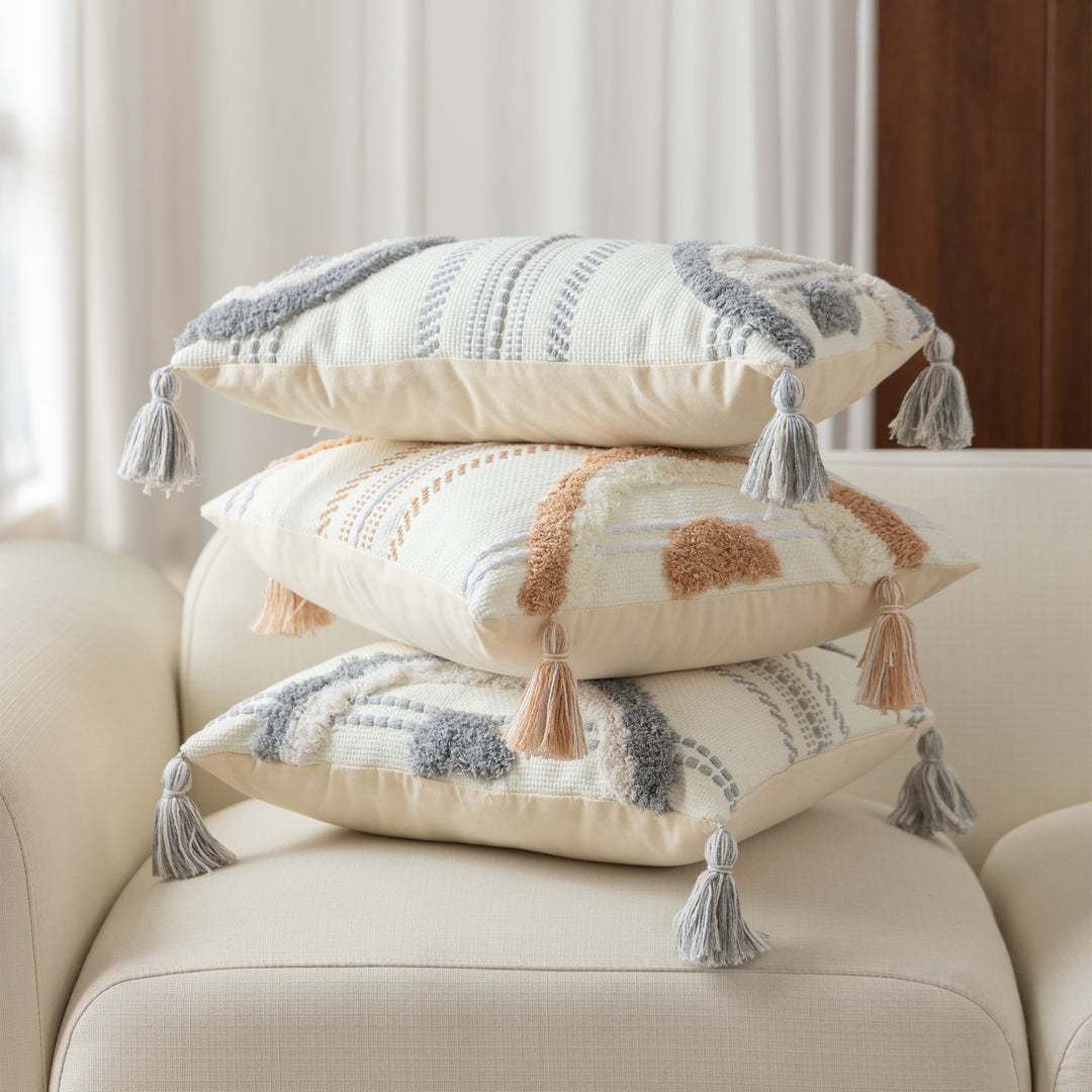 Woven decorative cushion cover with semi-circular tuft appliqué, fringe tassels, and concealed zipper Stornfield