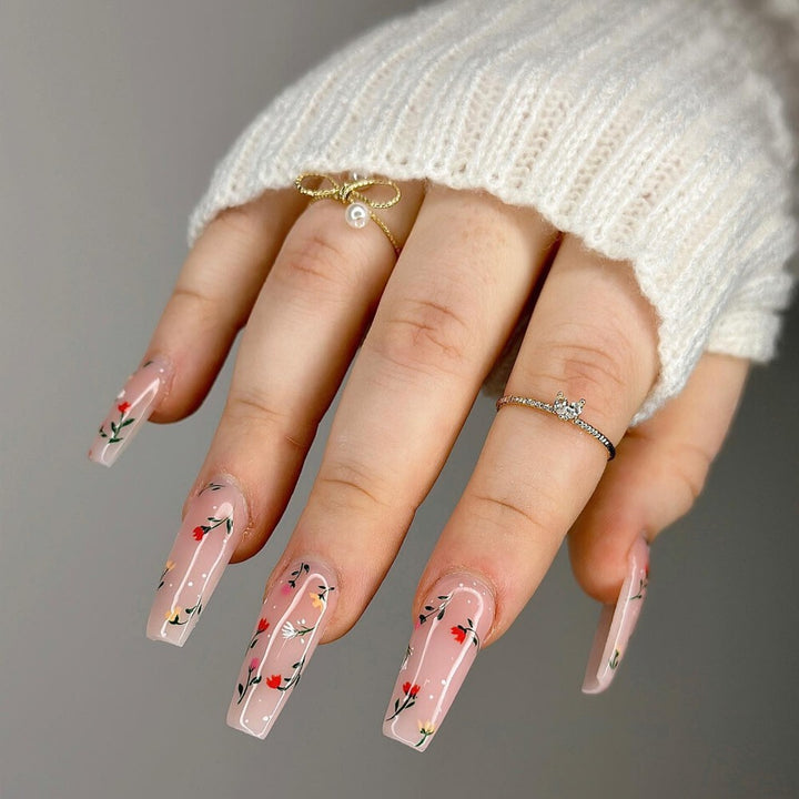 Elegant artificial nails with floral decorations Stornfield