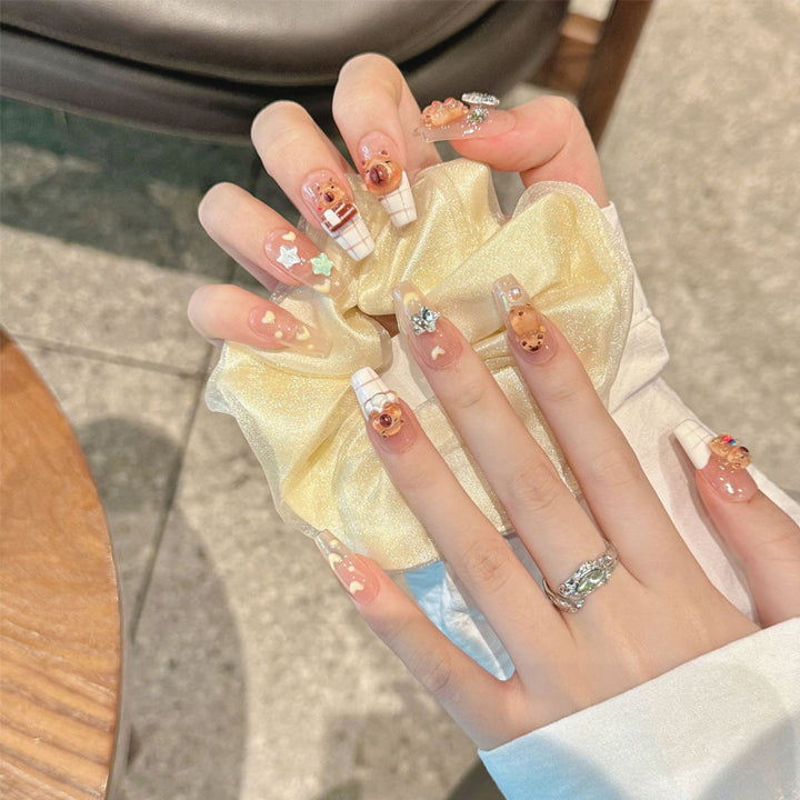 Artificial nail set with charming animal design and sparkling crystal embellishments Stornfield