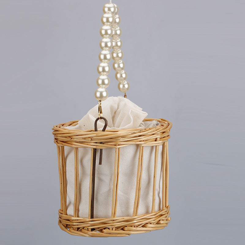 Women's elegant basket bag with pearl chain Stornfield