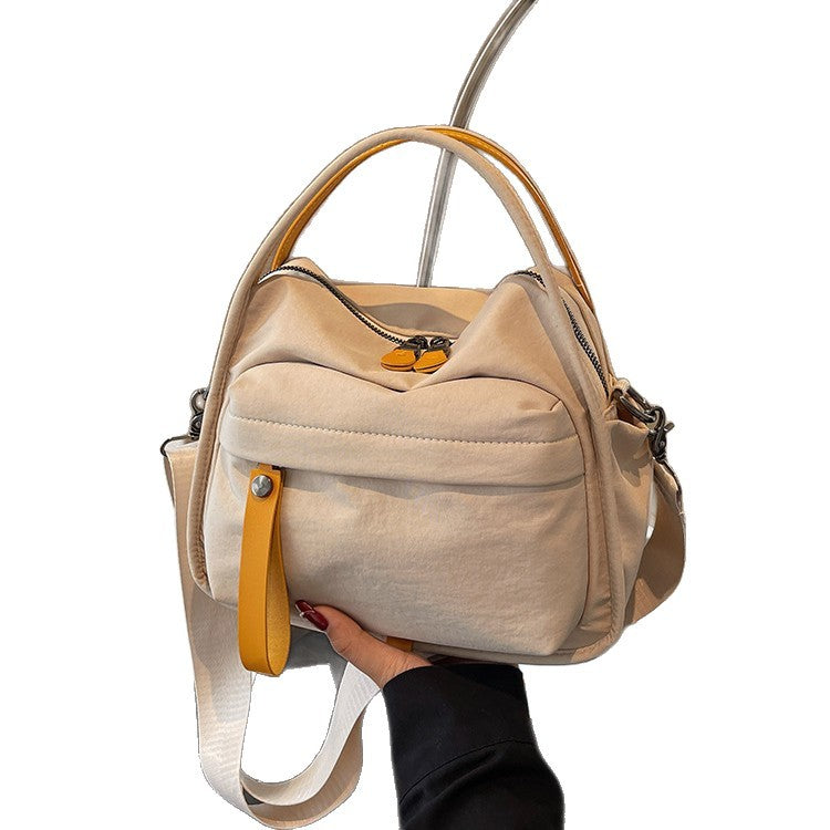 Fashionable shoulder bag with innovative structure and detachable carrying strap Stornfield