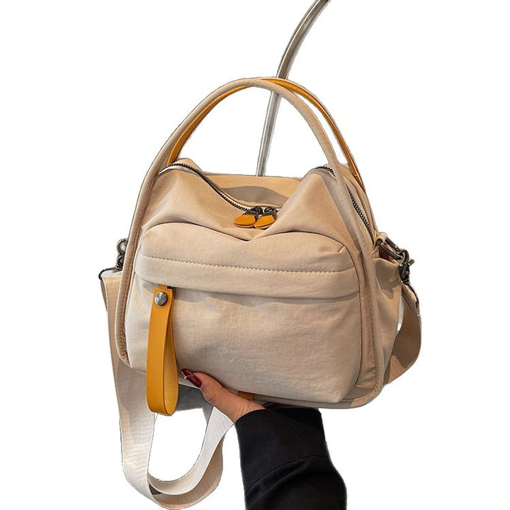 Fashionable shoulder bag with innovative structure and detachable carrying strap Stornfield