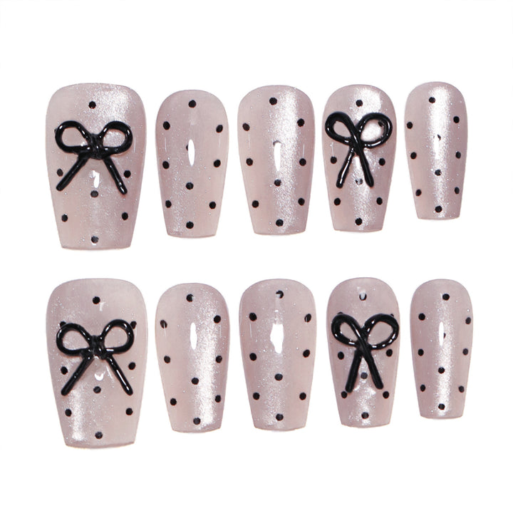 Artful Nail Extensions with Bow Pattern Stornfield
