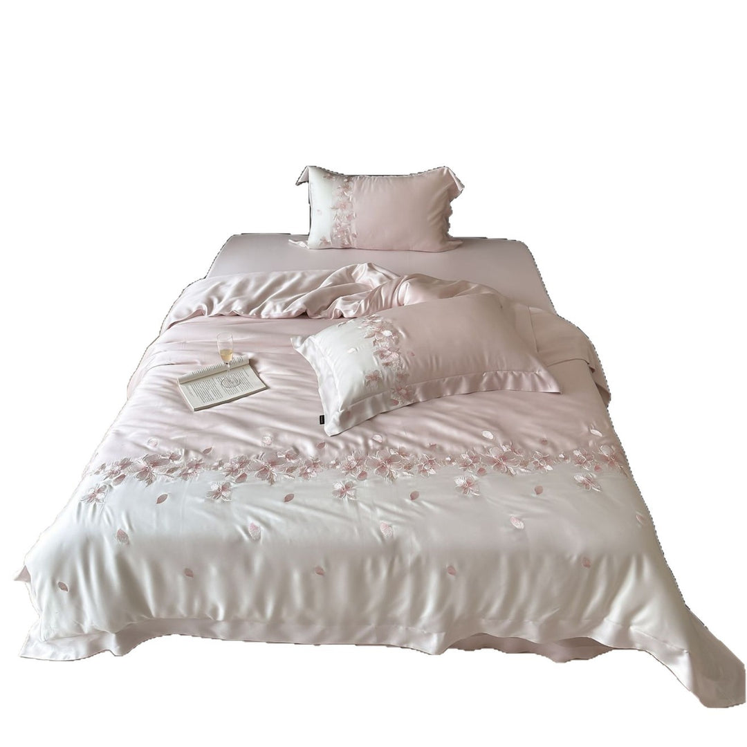 Luxurious satin bedding set with floral embroidery border and silky shine surface