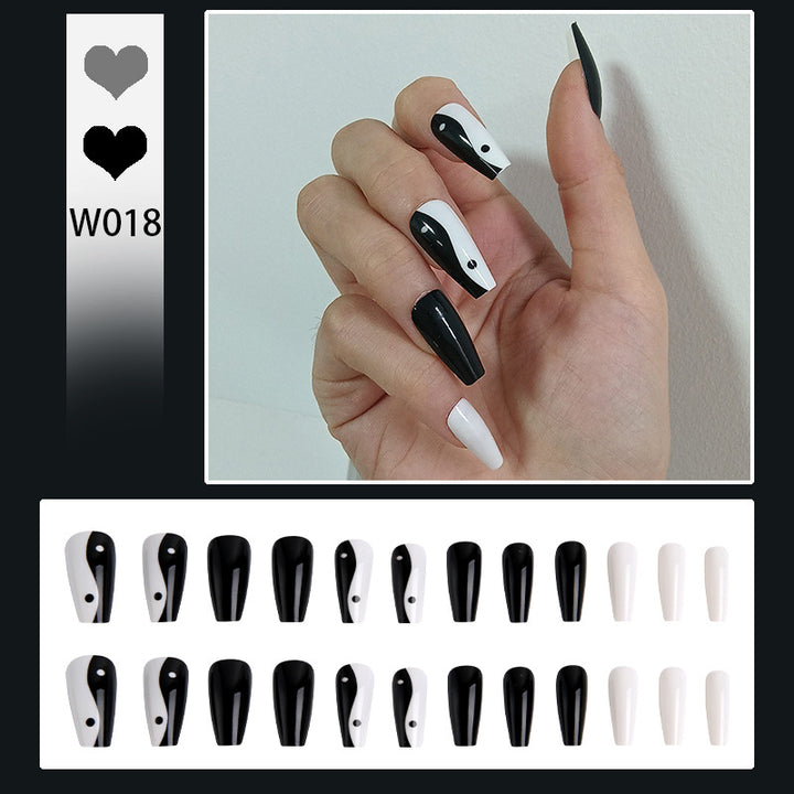 Artificial nails with Yin-Yang design Stornfield