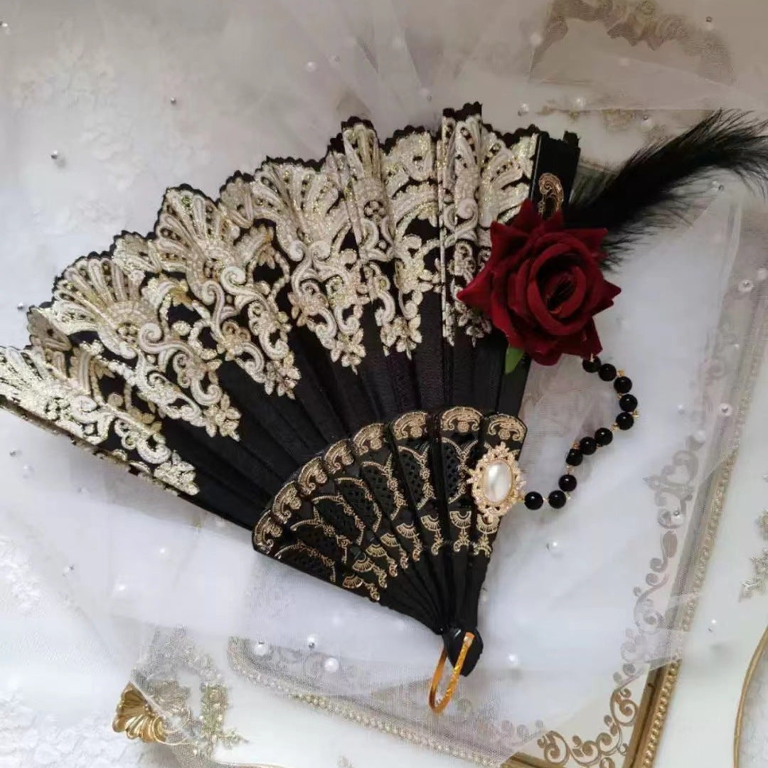 Women's fan with exquisite filigree ornamentation Stornfield