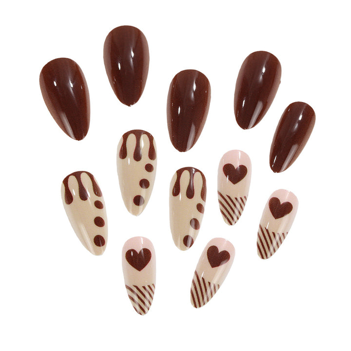 Artificial nails with creative heart and chocolate designs Stornfield