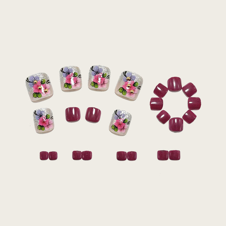 Artificial nails with floral designs and glitter effects Stornfield