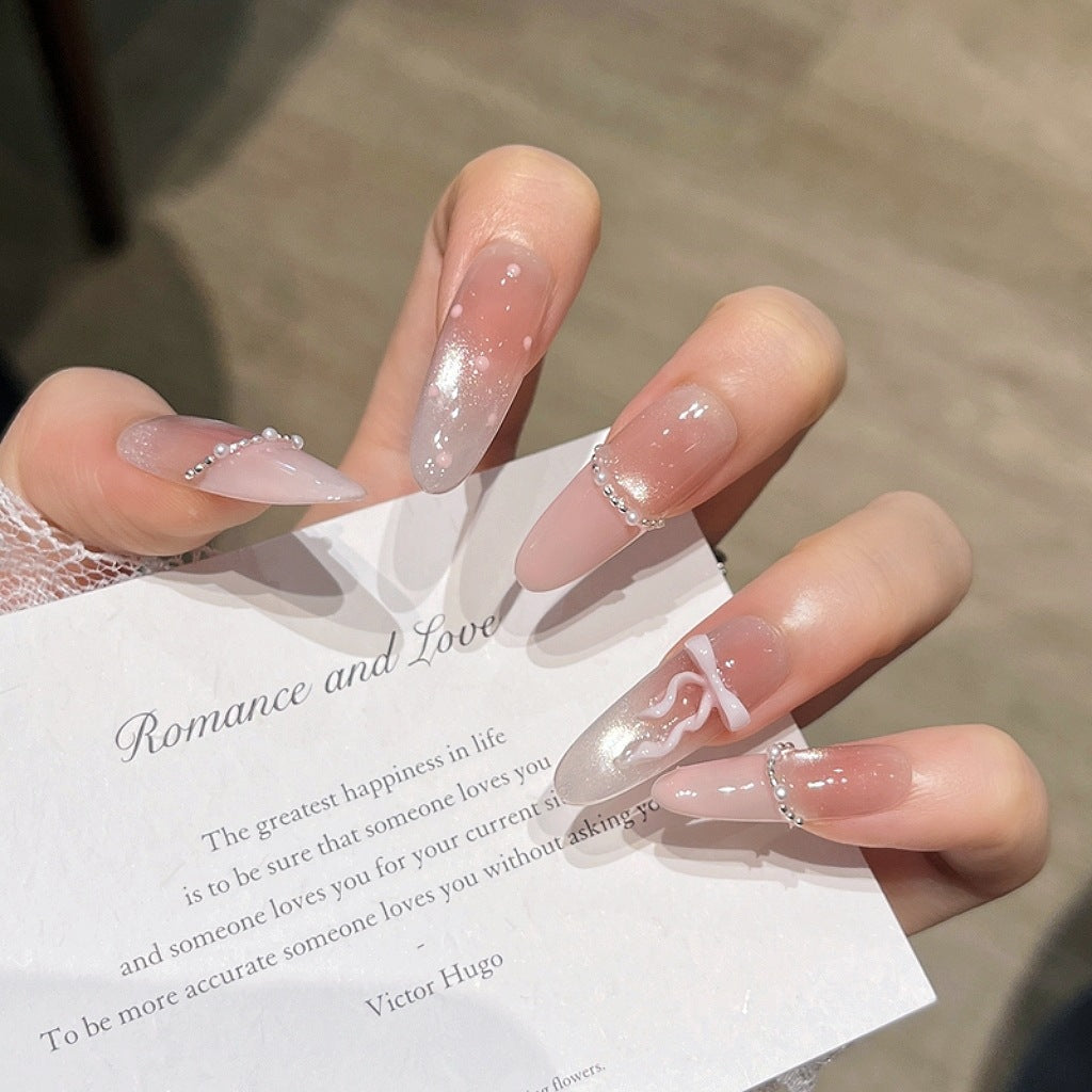 Elegant Long Press-On Nails with Decorative Accents Stornfield