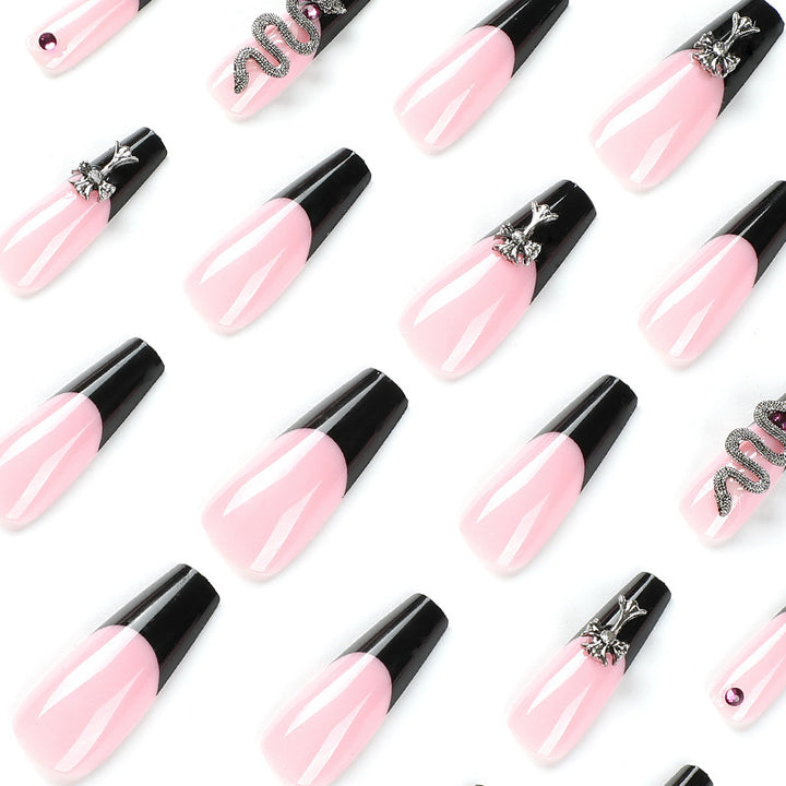 Artful stiletto nails with glitter accents and creative design Stornfield