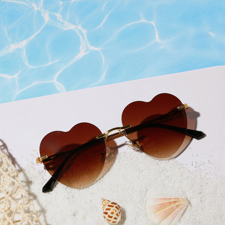 Ladies trendy heart sunglasses with mirrored lenses Stornfield