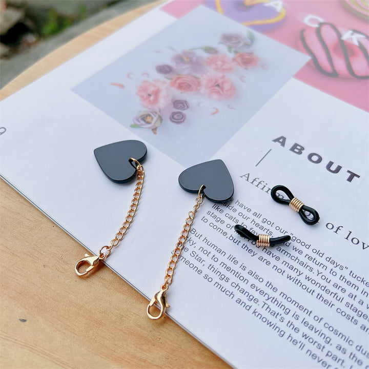Heart-Shaped Dangle Earrings with Golden Chain Stornfield