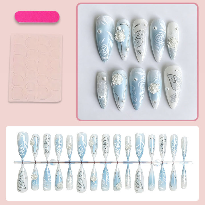 Artificial nail set with elegant floral motifs and glitter effects Stornfield