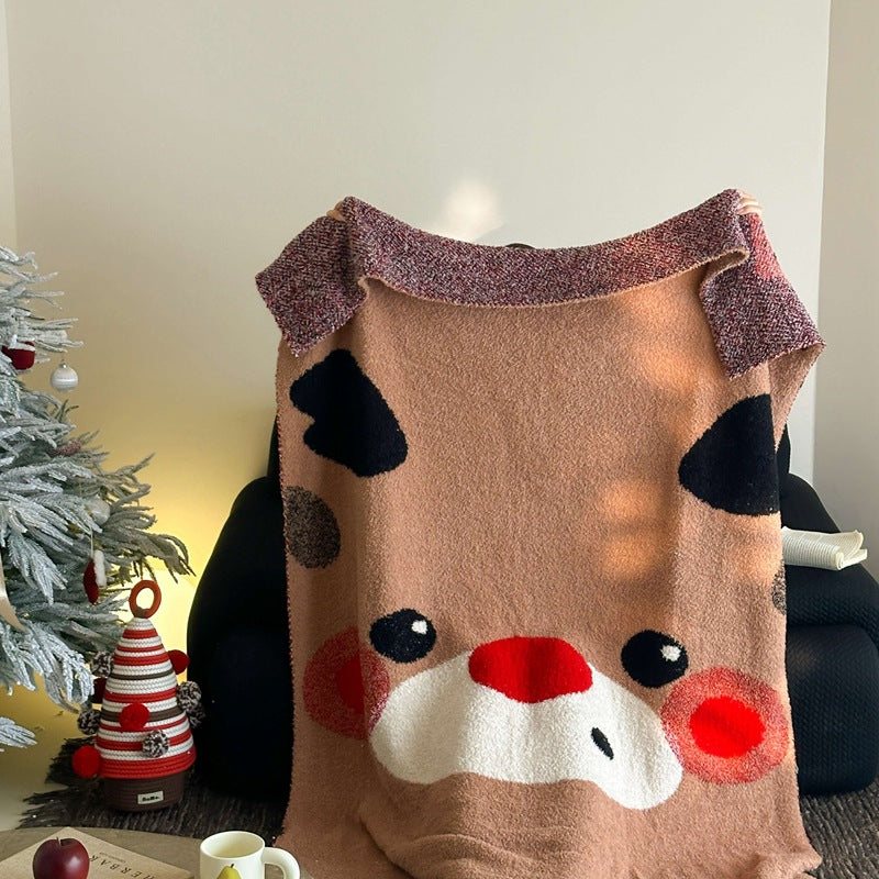 Cozy blanket in knit look with large animal face and soft terry surface