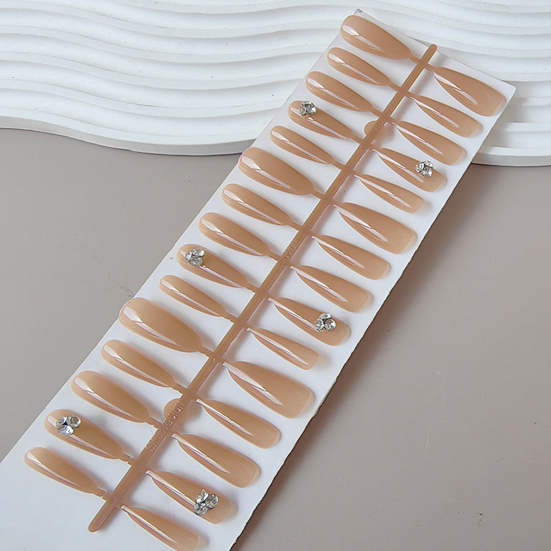 Acrylic nails with glamorous stone accents Stornfield