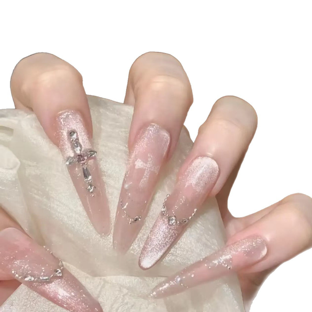 Glamorous Stiletto Nail Extensions with Rhinestone Accents