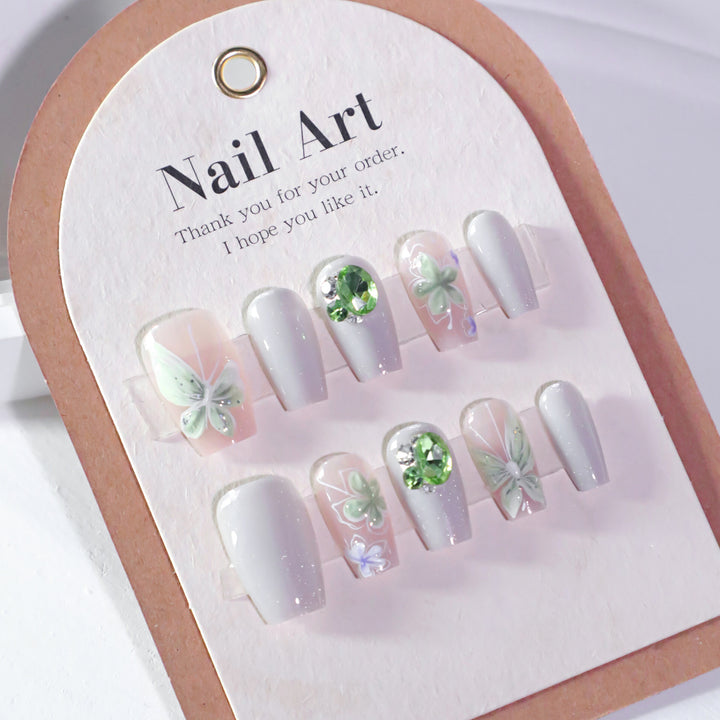 Elegant Nail Art with Floral Accents Stornfield