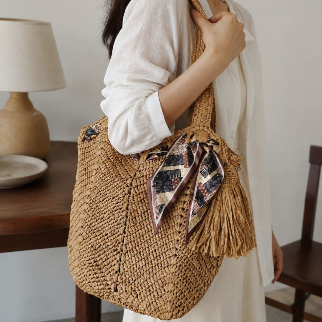 Handmade beach bag with playful pleat and tassels Stornfield