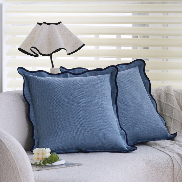 Square cushion cover made of breathable waffle fabric with decorative wavy piping Stornfield