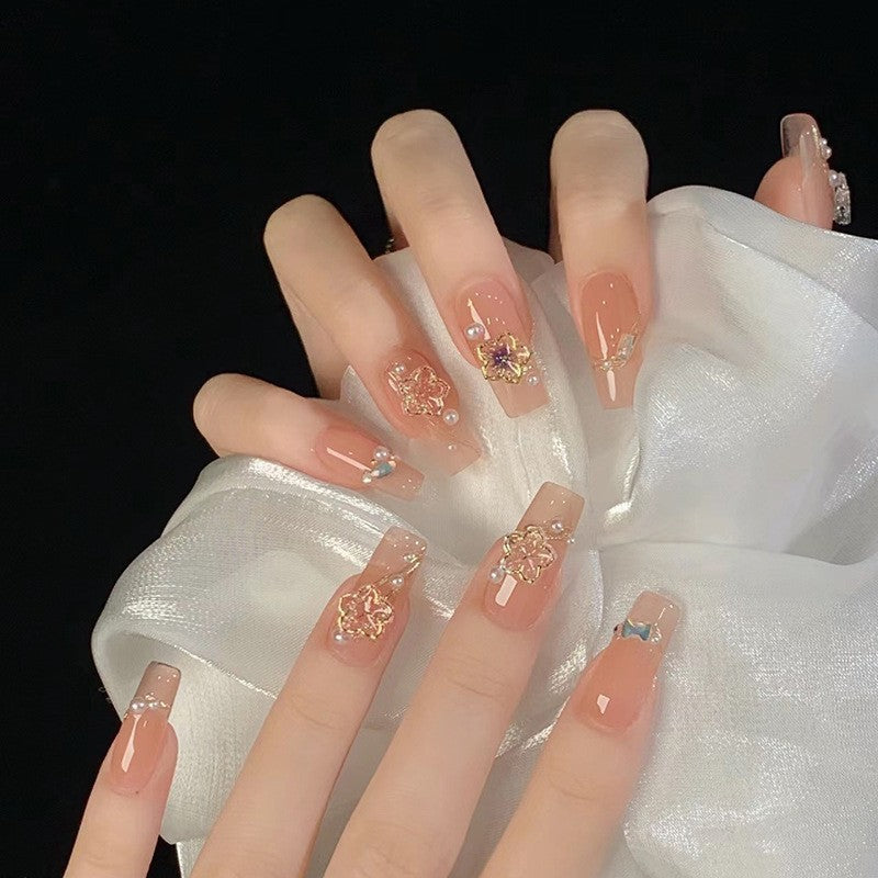Glamorous artificial fingernails with glitter and moon designs Stornfield