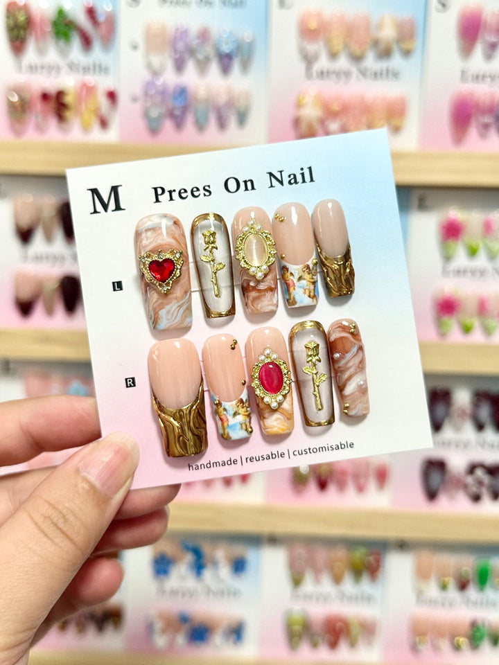 Artistic Press-On Nail Set with Floral and Green Accents