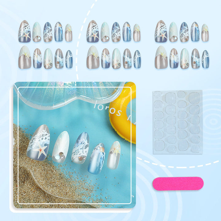 Artificial nails with maritime shell pattern Stornfield