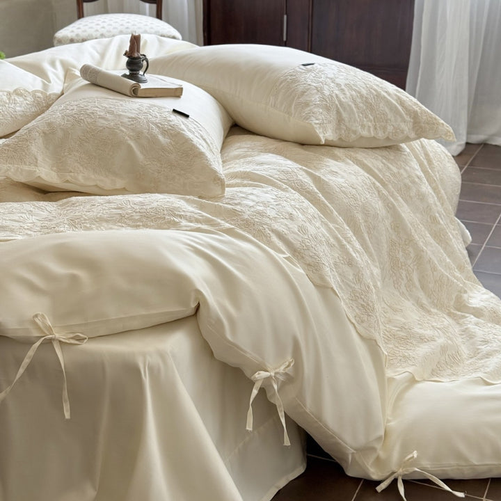 Bed linen set in linen-satin mix with floral relief jacquard and ties