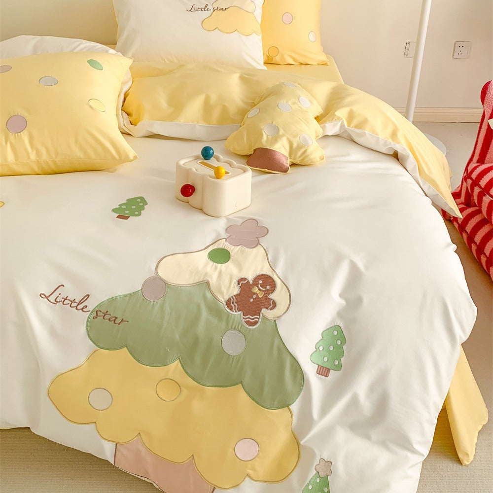 Children's bedding set with playful tree appliqués and soft pillowcases