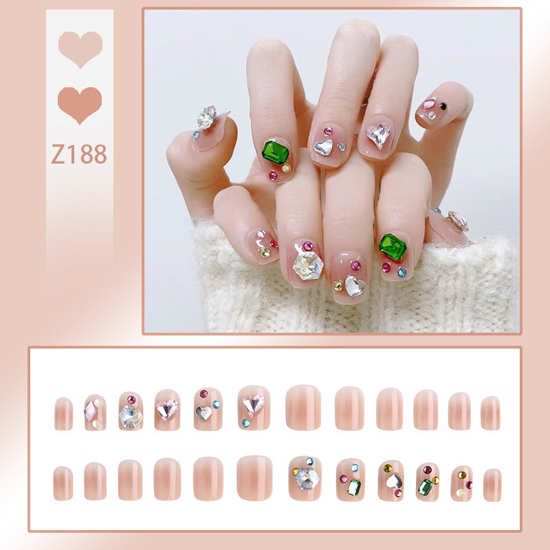 Acrylic nail set with sparkling 3D applications and beautiful heart designs Stornfield