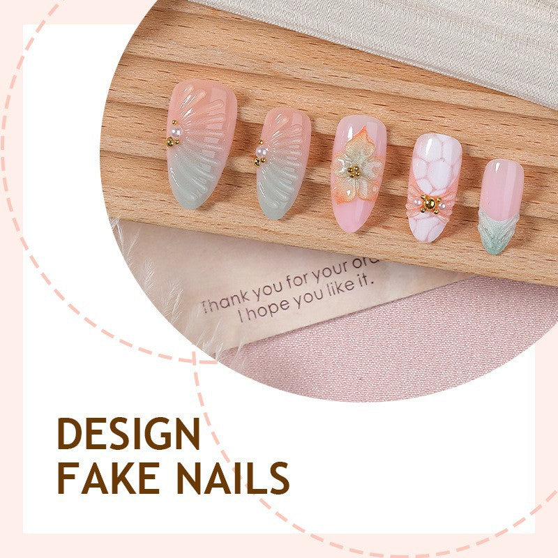 Artificial nail set with glamorous flower and glitter details Stornfield