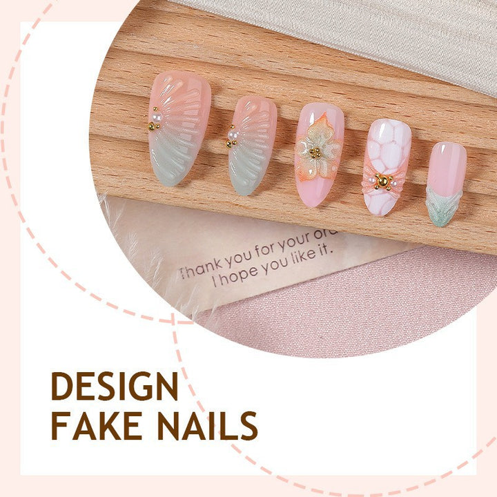 Artificial nail set with glamorous flower and glitter details Stornfield