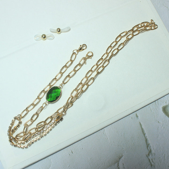 Elegant necklace with green stone and golden accents Stornfield
