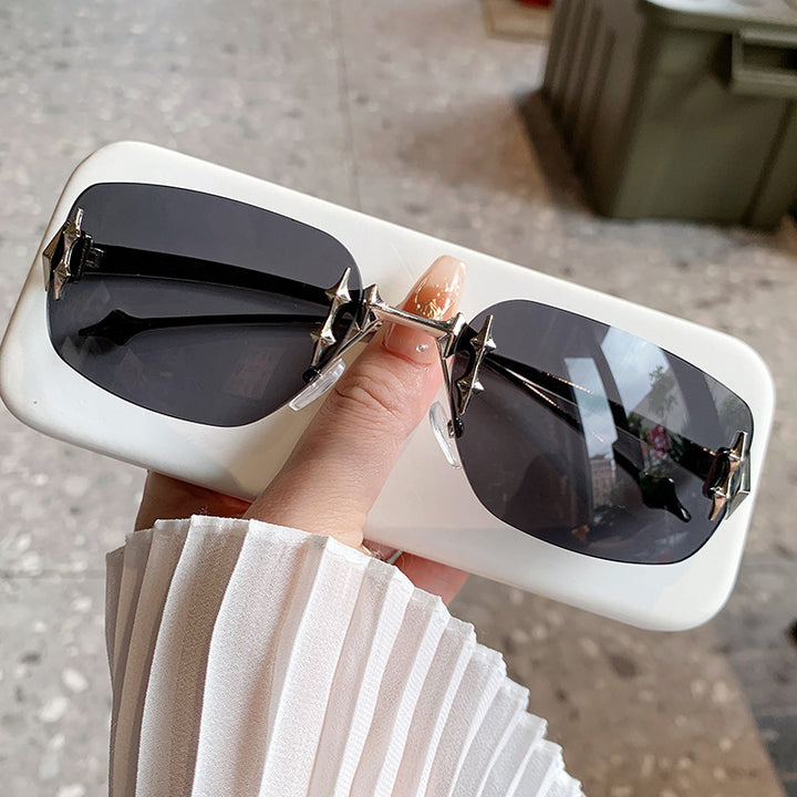 Women's designer sunglasses with elaborate embellishments Stornfield