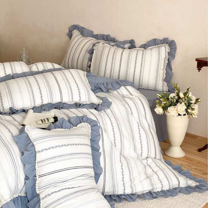 Cotton-linen bedding set with fine cherry embroidery and ruffled edge