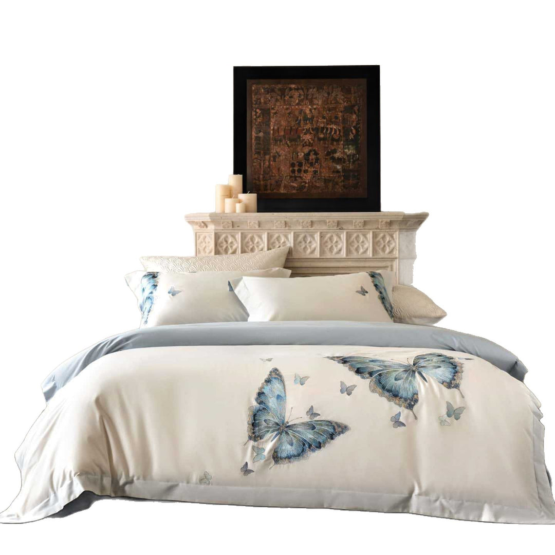Embroidered cotton satin bedding set with blue butterfly motif