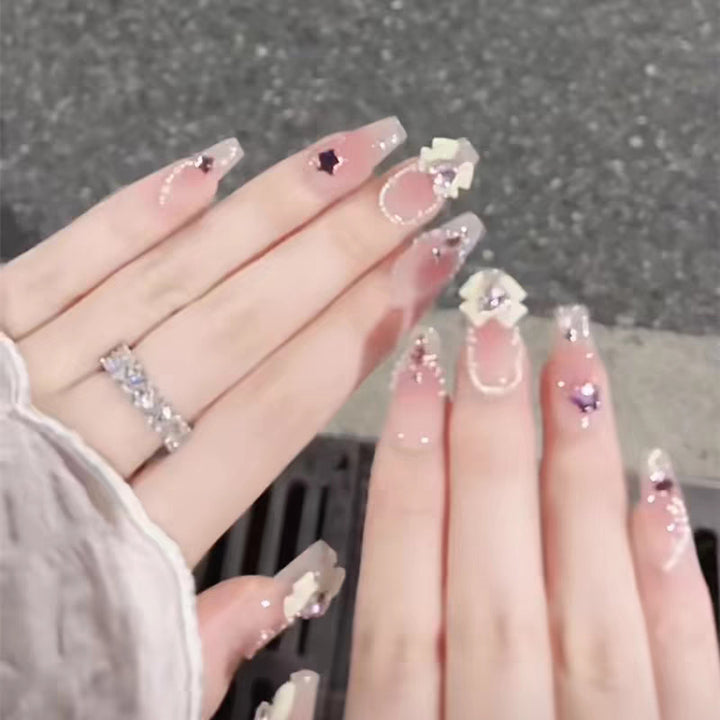 Artificial nails with floral accents Stornfield