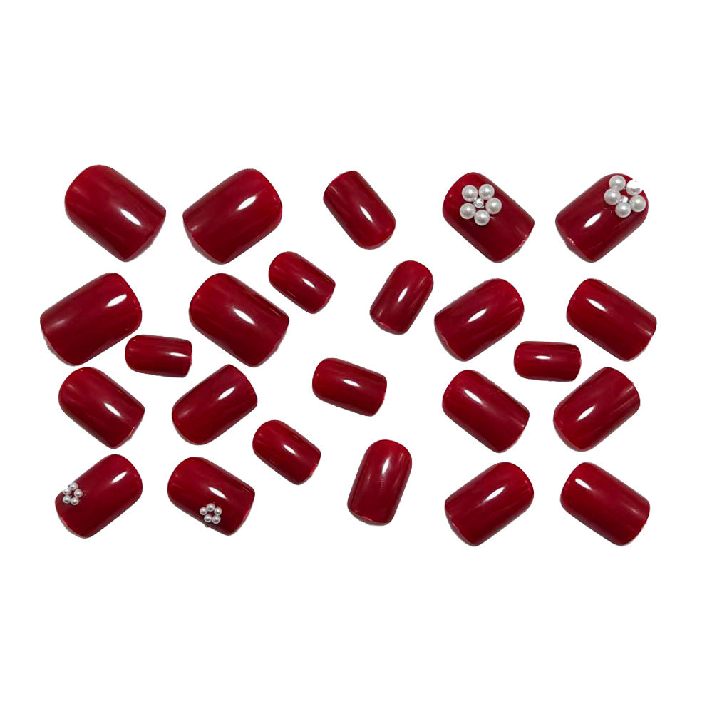 Artificial nails with glamorous decorations Stornfield