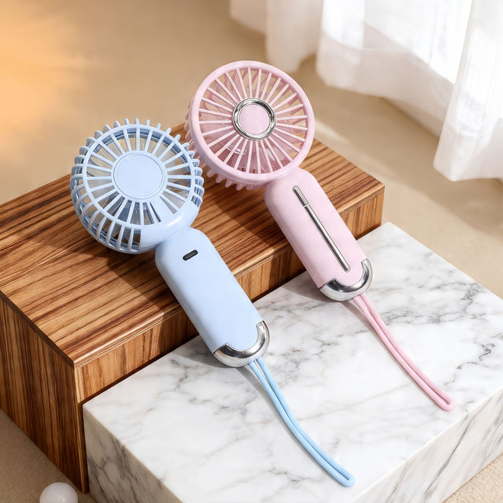 Women portable handheld fan with USB charging function and ergonomic design Stornfield