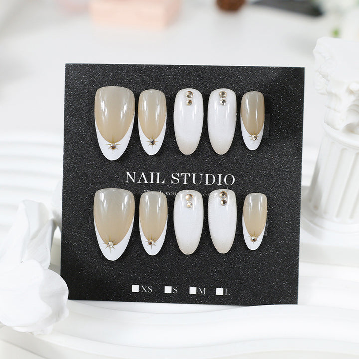 Nail set with elegant design elements and glamorous accents Stornfield